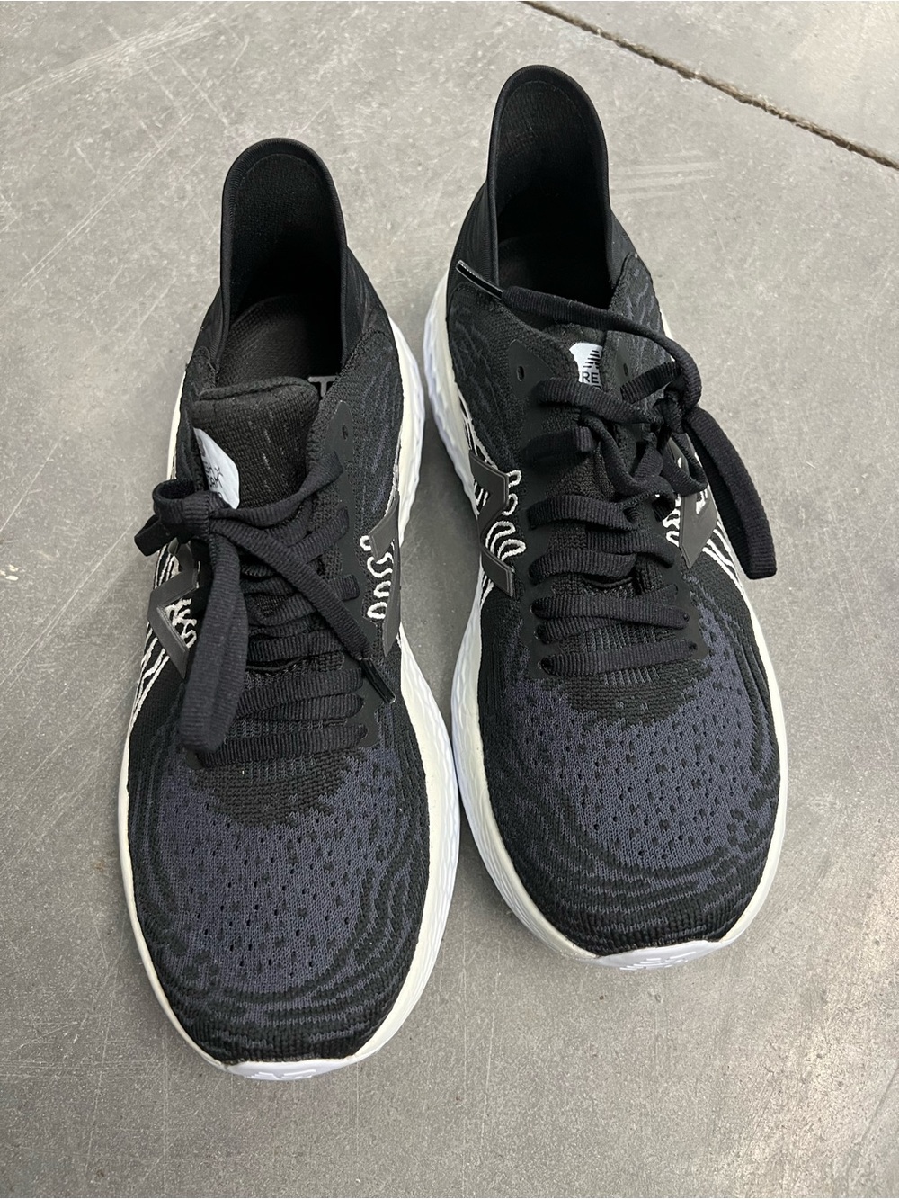 New Balance Women's Black Knit embroidered Sneakers